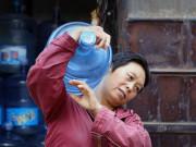 Tin tức - Bê 70 bình nước mỗi ngày, người phụ nữ kiếm 20 triệu/tháng, tậu nhà phố sau 3 năm