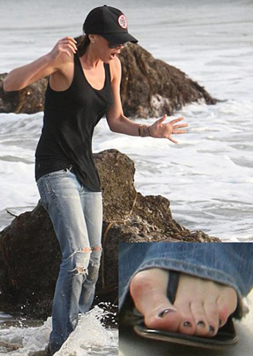 phai phau thuat chan vi ham giay cao, vo beckham van quyet khong tu bo so thich - 7