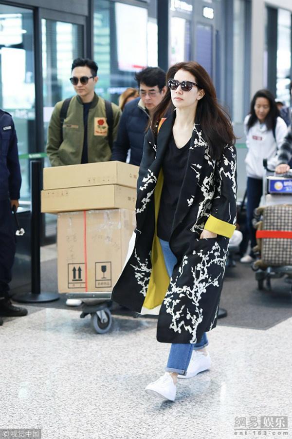 dang duoc nguong mo nhat cbiz, vo chong vien vinh nghi bat ngo to tieng cai nhau o san bay - 3