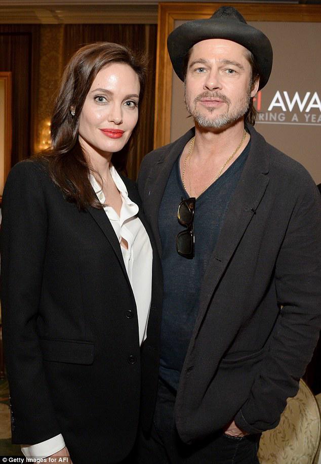 sau lan brad pitt hiem hoi cau xin angelina, ca hai cuoi cung cung dat thoa thuat nuoi con - 1