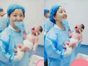 Bà bầu - Vừa đẻ, bé sơ sinh đã có hành động nghịch ngợm nữ y tá xinh đẹp khiến bố "đứng hình"