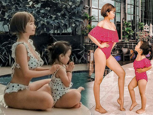 Vợ đại gia Minh Nhựa khoe dáng khi diện bikini đôi với con gái cưng