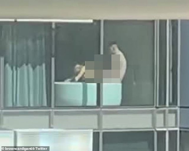 amp;#34;Quan hệamp;#34; giữa ban ngày, cặp đôi khiến nhân viên tòa nhà bên cạnh không thể tập trung làm việc - 1