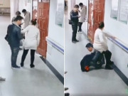 Bà bầu - Vợ bầu chờ khám mệt mỏi, chồng lấy lưng làm ghế khiến dân mạng xuýt xoa khen