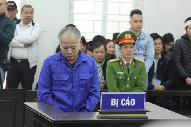 Nguyễn Văn Đông tại phiên toà sáng 12/12.