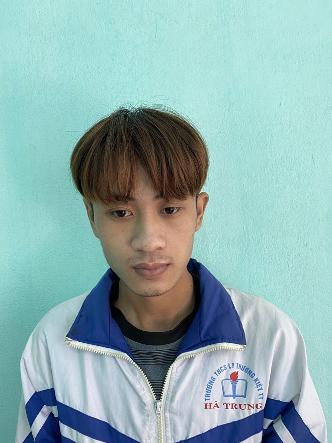 Vũ Tiến Long tại trụ sở công an.