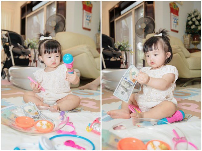  Ái nữ nhà Đông Nhi chọn ngay chiếc micro và tiền khiến nhiều người dự đoán cô bé sẽ nối nghiệp cha mẹ.