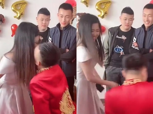 Chú rể cưỡng hôn phù dâu ngay trong phòng tân hôn, thái độ của cô dâu gây choáng