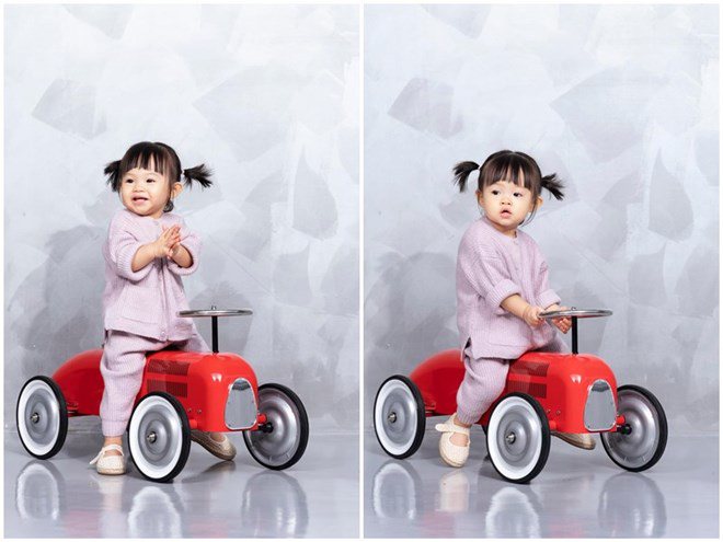 Cô bé nhí nhảnh bên siêu xe.