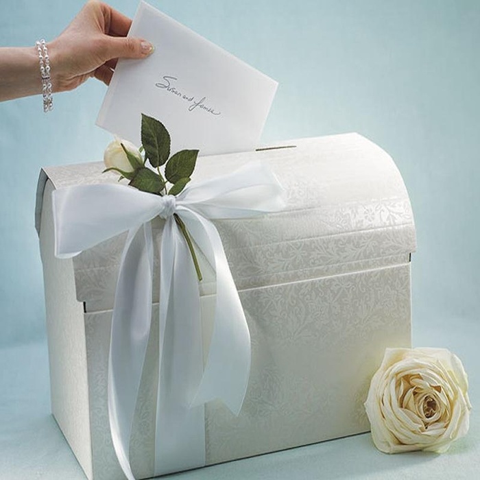 Không thể dự đám cưới nhưng tôi vẫn biết ý gửi tiền mừng cưới. (Ảnh minh họa)