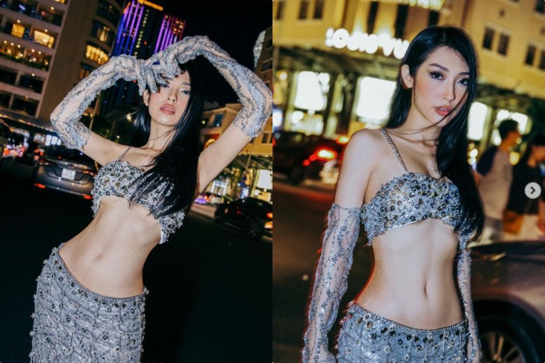 Kiểu áo ngắn chẳng tày gang giúp cô nàng khoe được cơ bụng cực phẩm, chiếc eo bé xíu và vòng 1 đẫy đà. Thậm chí, trong khoảnh khắc khi vươn tay, Khổng Tú Quỳnh còn để lộ chân ngực lấp ló. 