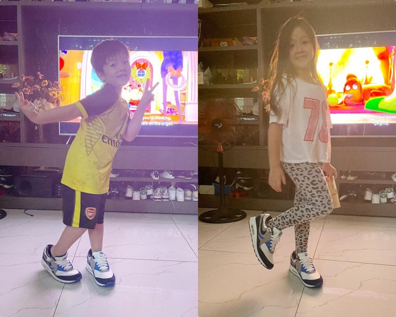 Cadie và Alfie thích thú xỏ chân đôi giày thể thao bố mua tặng cho.