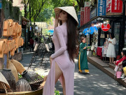 Thời trang - Chân dung Á hậu mặc váy xẻ cao tới hông, đội nón lá gây tranh cãi tại phố sách