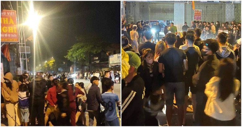 Hàng trăm người vây quanh nhà nghỉ để chứng kiến vụ đánh ghen ở Nghệ An. Ảnh: Vietnamnet