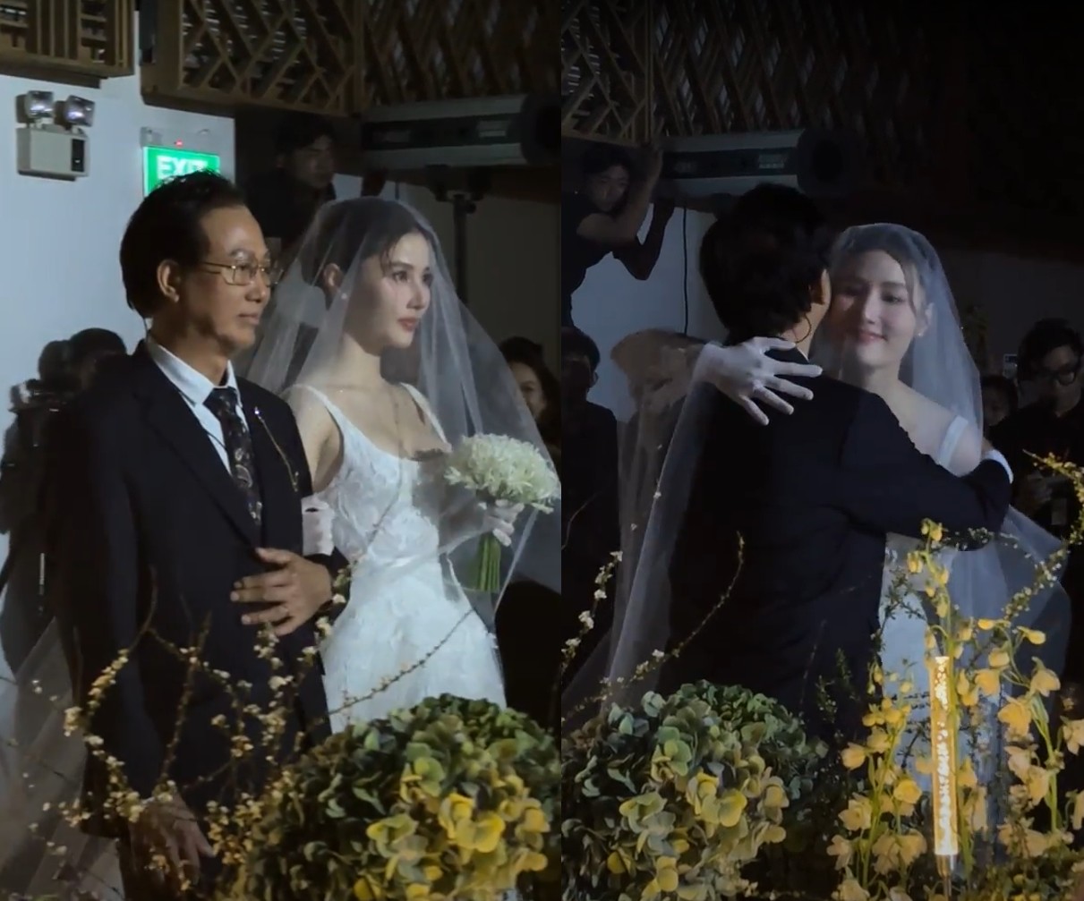 Diễm My được bố ruột dắt vào lễ đường.