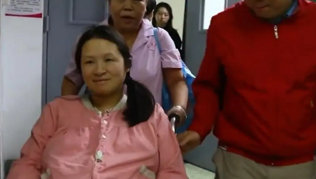 Nụ cười hạnh phúc của người mẹ.