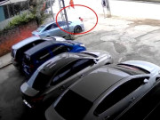 Tin tức - Xe ô tô đi ngược chiều, chèn qua người cháu bé đang ngồi trên vỉa hè