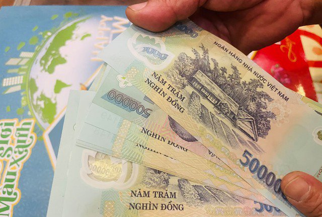 Thưởng Tết có phải là khoản bắt buộc?. (Ảnh minh họa).