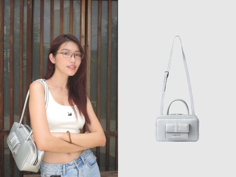 Trong outfit áo croptop trắng phối quần jeans xanh nhạt, Quỳnh Châu mang túi đeo vai nhỏ màu bạc ánh kim. Đây lại là một mẫu túi bình dân khác đến từ thương hiệu Việt chỉ có giá 720 nghìn đồng.