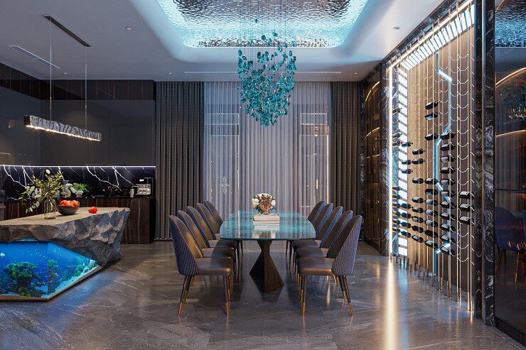 Không gian bên trong lấy ý tưởng vũ trụ, mang lại cảm giác hiện đại, sang trọng nhưng không kém phần ấm cúng. Phòng khách rộng lớn với trần cao, đèn chùm pha lê, nội thất gỗ kết hợp kính tạo sự hài hòa.