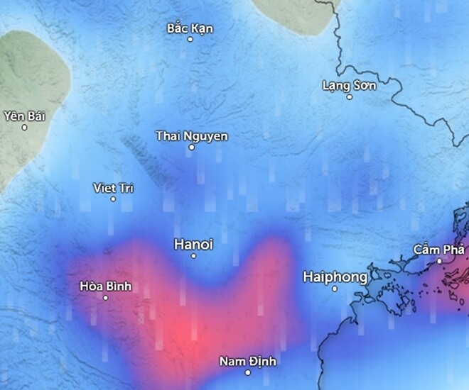 Dự báo mưa diện rộng ở miền Bắc vào chiều mai, 13/12 (những vùng màu xanh là mưa nhỏ đến vừa, màu đỏ là mưa vừa đến mưa to). Ảnh: Zoom Earth, OpenStreetMap, ICON.