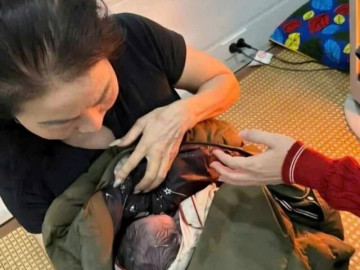 Tin tức - Tìm người thân của bé sơ sinh bị bỏ rơi cạnh bờ mương, người tím tái