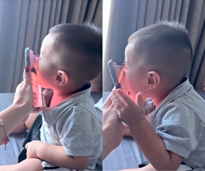 Con trai Quang Minh hôn tới tấp vào màn hình điện thoại khi gọi video với bố.