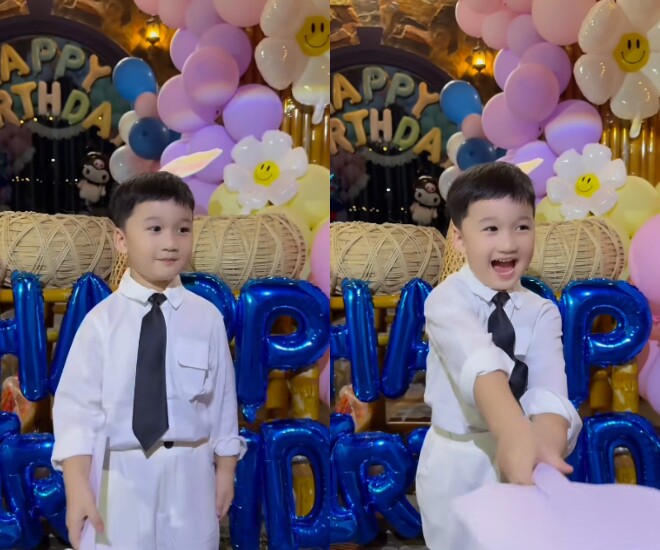 Con trai Hà Trí Quang diện trang phục trắng, được khen như “tiểu thiếu gia”.