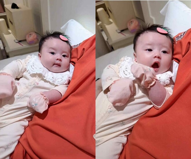 Con gái Phương Lê - Vũ Luân biểu cảm cưng “xỉu” khi được ba bế.