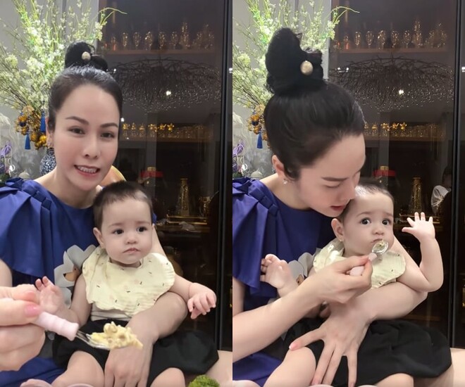 Con gái 10 tháng tuổi của Nhật Kim Anh ăn cực sung khiến mẹ đút không kịp.