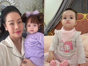 Ái nữ lai nhà Nhật Kim Anh là phiên bản mini của mẹ, ánh mắt long lanh nhìn không rời khi thấy phụ huynh trên tivi