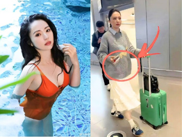 Bị nghi mang bầu, mỹ nhân đình đám thản nhiên cởi áo ngay tại sân bay, để lộ vòng 2 khiến ai nấy choáng váng