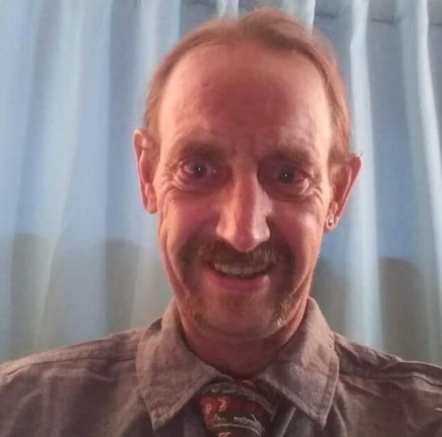 Chân dung Brian Keith Strachan.