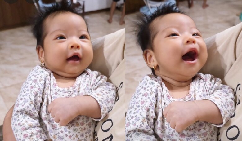 Em bé Ê Đê càng lớn càng rõ nét xinh xắn.