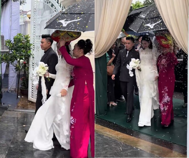 Vợ chồng nàng hậu được che chắn kỹ lưỡng vì trời đổ mưa.