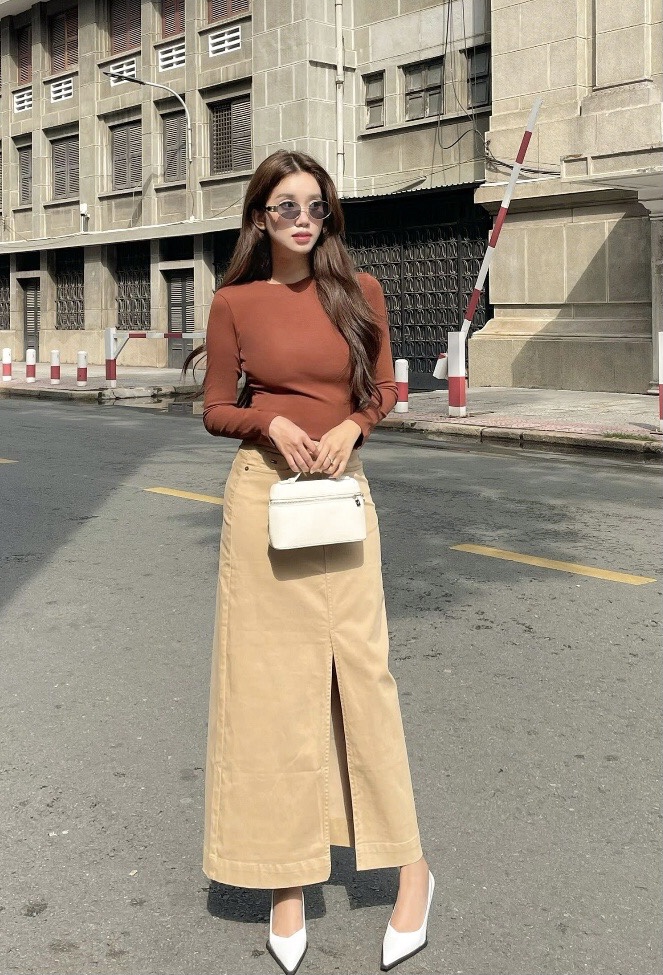 Mặc chân váy xuyên tuần, tôi nhận ra 4 dáng amp;#34;hack chânamp;#34; thần kỳ, chị em công sở nào cũng nên có - 10